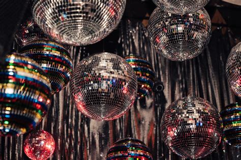 Disco - Disco is a genre of dance music and a subculture that emerged in the 1970s from the United States' urban nightlife scene. Its sound is typified by four-on-the-floor beats, syncopated basslines, string sections, brass and horns, electric piano, synthesizers, and electric rhythm guitars. 