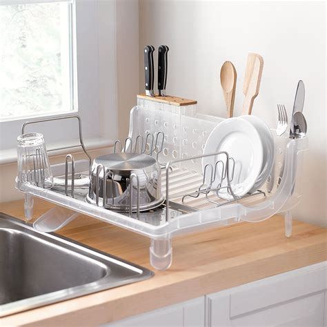 Dish rack dollar tree. Farmhouse Over The Sink Shelf. The Farmhouse Over the Sink Shelf is designed to fit perfectly over most kitchen sinks so that you can use all your kitchen space well. This over-the-sink rack keeps dishes clean and out of harm’s way, where they are easily accessible for drying. The farmhouse theme adds rustic charm to any kitchen design. 