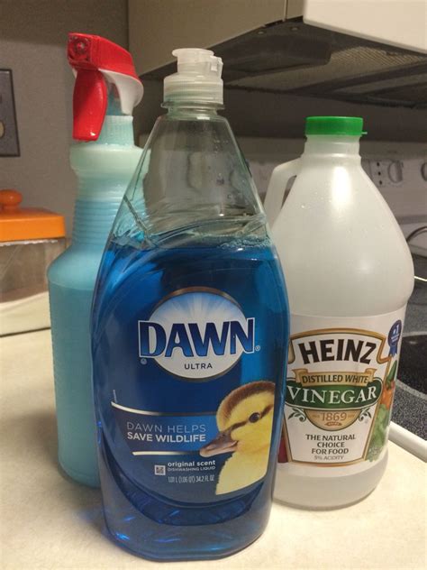 Dish soap and vinegar. Mix 1 cup of vinegar with 1 teaspoon of Dawn dish soap in a spray bottle. 2. Spray onto the stain, covering it thoroughly. 3. Leave for 15 minutes. 4. Scrub with a hard-bristle brush. This should ... 