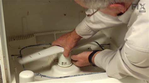 Dish washer repair. Check to see if the float valve is stuck. If it is, clean away food debris around the float. With a screwdriver handle, lightly tap the top of the float to free it. Step 2: If tapping doesn't work, remove the lower access panel and locate the bottom portion of the float and float switch. 