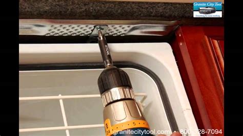 Dishwasher bracket. Have you ever noticed that your dishwasher is not draining properly? This could be a sign of a clogged dishwasher drain. A clogged dishwasher drain can cause water to back up into ... 