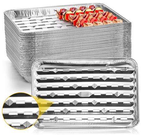 Disposable grill trays.  The pans have a ribbed bottom surface that helps create ...