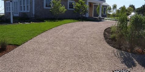First, as with most driveway materials, a gravel base is installed. T