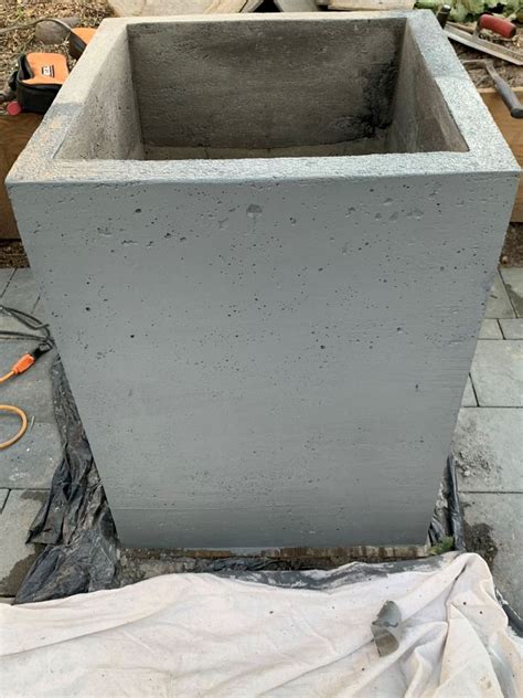 Tutorial Steps For A Colorful DIY Concrete Planter With A Stain. Step 1. Prep The Outer Planter Mold. Step 2. Make A Base For Holding The Molds. Step 3. Cut The Cardboard Tube To Size. Step 4. Secure the Inner Mold To The Base.. 