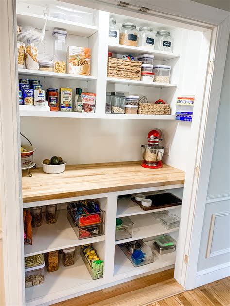 Diy pantry shelves. Construction. Grab your construction glue and the appropriate can size for the specific compartment (ie: shelf width). In the picture below, the top of the organizer is on the right, the bottom is on the left. The cans will roll down each shelf and onto the next. Angle your shelves so that the cans will roll independently. 