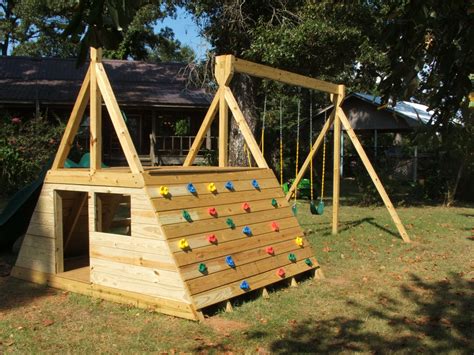 Diy playset. painted the playhouse. Make sure to seal the raw wood to help preserve it. Attach the 5 foot slide, steering wheel and telescope. Enjoy your DIY Playset! 