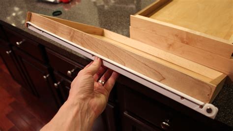 Mark the spots where the drawer slide will go inside the furniture. Attach it using the needed screws. Test it with the other part of the slide. It is before you install the other side of the drawer. Once you see it working well, mark the side of the drawer to know where to put the other side of the drawer slider.