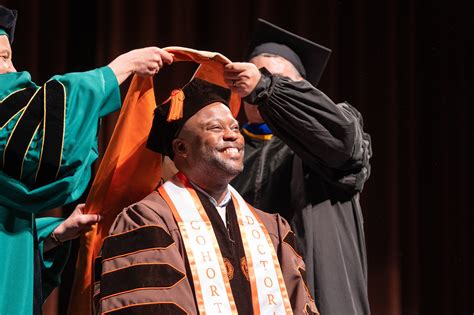 Doctoral candidates who expect to earn their degrees in May 2024 MUST complete all their degree requirements (including submission of final dissertation and signed title page) by April 19, 2024. Questions regarding the Doctoral Hooding Ceremony should be directed to the Graduate School at 315-443-4145.