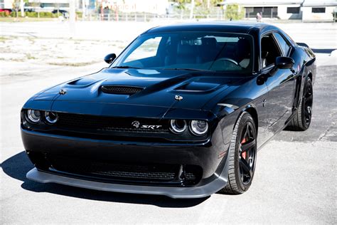 Pricing Details. The 2022 Dodge Challenger SRT Hellcat Widebody starts at $77,535 before options, taxes, and delivery charges. Buyers have the ability to increase that already stout starting price with dozens of options and upgrades. They include premium paint colors, graphics packages, and various interior packages.. 