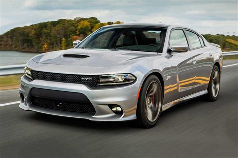 The 2020 Dodge Charger SRT Hellcat Widebody Is a Monster Sedan That Runs 10s. With 3.5 inches of added width, standard 11-inch-wide wheels, and a 707-horsepower supercharged V-8, this is one crazy family car. www.roadandtrack.com. It's probably my age that tricks people into thinking I'm an adult.. 