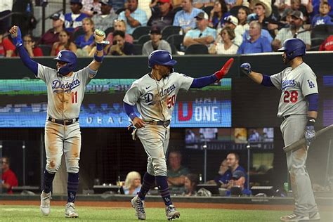 Dodgers beat Texas 11-5 in return to Globe Life Field, where they won 2020 World Series; Seager hurt