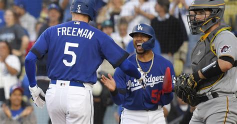 Dodgers beat the Pirates 5-2 to pull within a half-game of AL West-leading Arizona