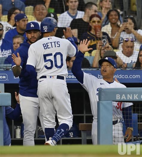 Dodgers host the Brewers, aim to extend home win streak