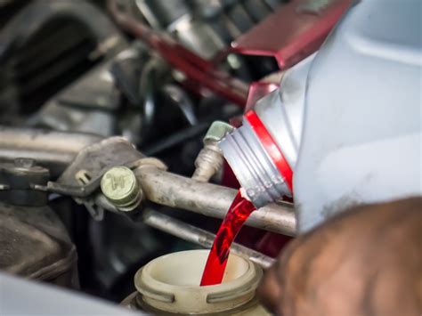 An automatic transmission uses fluid for 