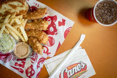 Does raising cane. What oil does Raising Canes use? Raising Cane's cooks all of our fried foods in an all-vegetable, trans fat free blend of soybean and canola oil. According to the FDA, highly refined soybean oil is not considered allergenic, and therefore is not labeled as such. Please inform the Manager if you have a food allergy. 