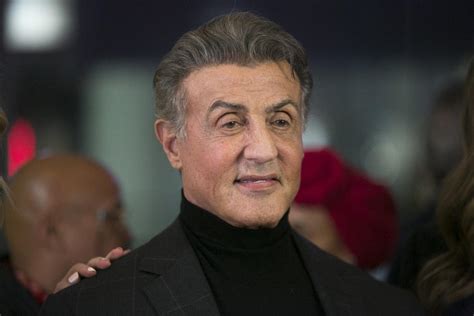 Sylvester Stallone has really thick hair for a 70-year-old. Offsite Li