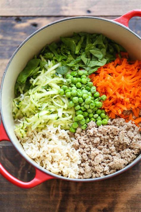 Dog food recipe. Meat and four veg · 1kg of lean minced beef · 250g of brown rice · 100g of spinach · 100g of peas · 2 grated carrots · 2 grated courgettes... 