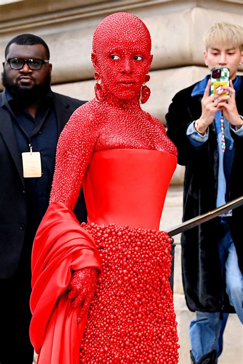 Doja cat paris fashion. Jan 23, 2023 ... Doja Cat stole the show in Paris thanks to her 'Doja Inferno' look which took close to five hours to complete. ... The Spring 2023 couture shows ... 