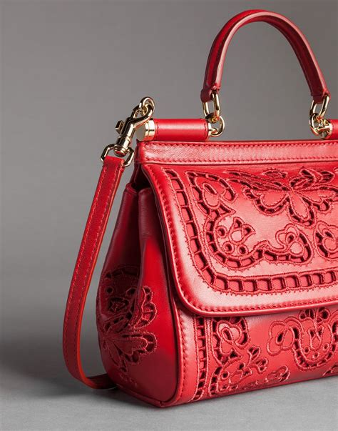 Dolce and gabbana sicily bag. Colors. Details. Large Sicily handbag. Art. Nr. BB6002A100180203. The brand icon par excellence, this large Sicily bag comes in pop colors. Featuring an understated and feminine shape, this Sicily bag comes in Dauphine calfskin. Large Sicily bag in Dauphine calfskin: • Yellow. • Front flap with hidden double magnetic fastening. 