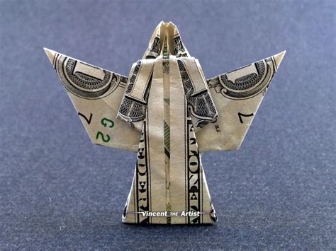 Dollar bill origami angel. Origami Angel by Mike Case, ©2006Last modified February 2006. 1) Fold a preliminary base. 2) Squash fold. 3) Repeat step 2 on the other 3 flaps. 4) Petal fold. Repeat on the two sides and the rear. 5) Sink the top approximately where shown (a deeper sink will make the face bigger). 6) Valley fold the points down on all the sides. 