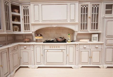 CB2115 - Kitchen Cabinet Kit (F-280) Chrysnbon Furniture Kit F-280 contains detailed and accurately scaled 1" = 1' wood-grained polystyrene (plastic) pieces to construct a vintage looking dollhouse miniature kitchen cabinet perfect for storing dishware and other cooking/baking necessities.... 