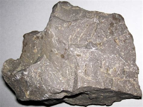 Sedimentary Rock Specimens. Sedimentary rocks are formed at or near the surface of the earth. Most of these sediments are deposited in beds or layers by water or wind as a result of weathering (erosion). Sedimentary rocks can be classified by their mode of origin as clastic, chemical or organic. Clastic sedimentary rocks like sandstone are ... . 