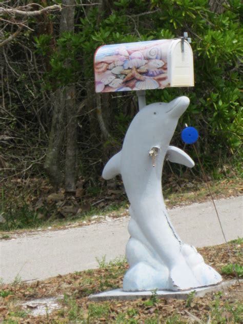 The Dolphin Mailbox features the Louisiana Mailbox with a dolphin moun