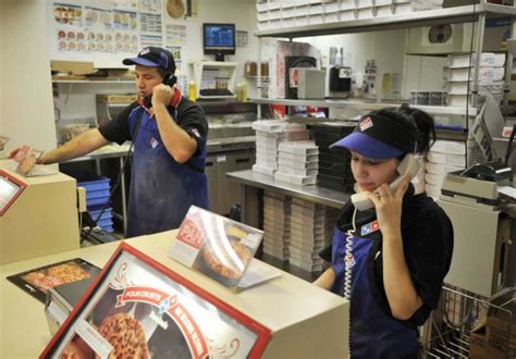 To get an entry-level job at Domino’s as a Customer Service Representative, you must be at least 16 years old. To land a job as a Delivery Driver or Assistant Manager, you generally have to be at least 18 years old. Because many stores are franchises, the hiring rules and minimum age requirements do vary based on location.
