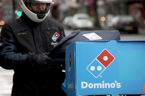 To get an entry-level job at Domino’s as a Customer Service Representative, you must be at least 16 years old. To land a job as a Delivery Driver or Assistant Manager, you generally have to be at least 18 years old. Because many stores are franchises, the hiring rules and minimum age requirements do vary based on location. . 