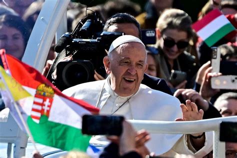 Don't shut door on foreigners or migrants, Pope Francis says in Hungary