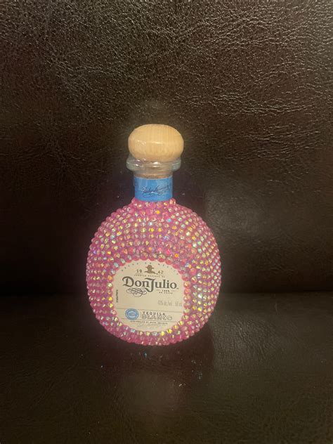 Don julio pink bottle. Check out our don julio 1942 custom bottle selection for the very best in unique or custom, handmade pieces from our labels shops. ... Bedazzled Sparkly Bling Purple and Pink Don Julio 1942 Tequila Bottle (1) $ 550.00. FREE shipping Add to Favorites Custom Bottle $ 650.00. FREE shipping Add to Favorites Don ... 