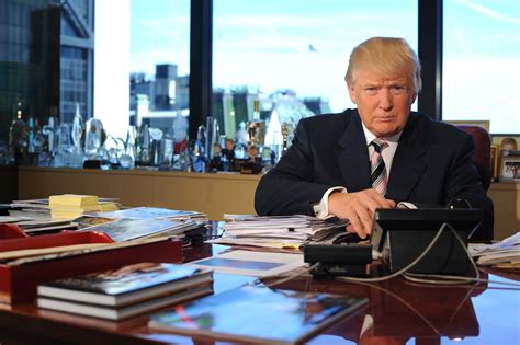 President Donald J. Trump by Pari Dukovic for Time magazine, ... the image depicts him perched at the edge of a maroon chair with one hand resting on the historic Resolute Desk in the Oval Office. .... 