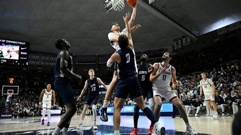 Donovan Clingan scores 29 to lead No. 4 UConn over UNH 84-64 for a 24th straight nonconference win