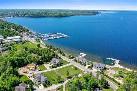 Door county real estate. 1. STURGEON BAY - A Baileys Harbor man and real estate developer is facing as much as 250 years in prison and $1 million in fines after he was charged with 10 counts of possession of child ... 