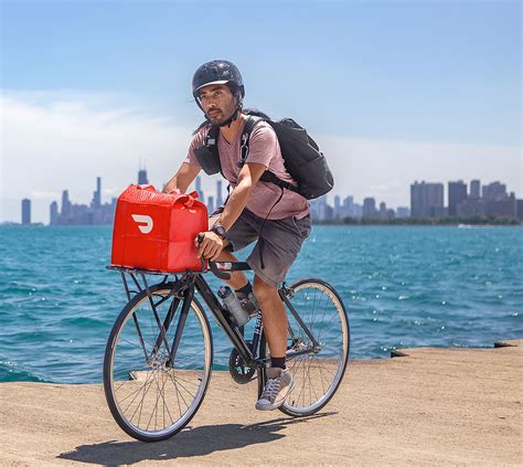 Doordash on bike. .  <a href=https://admin-demos.7steps.ai/assets/images/0cq3hklqj/index.php...