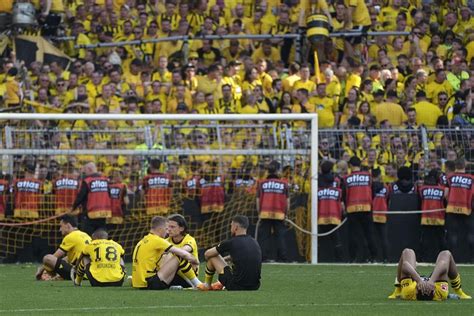 Dortmund’s players, fans stunned after falling short in German title race