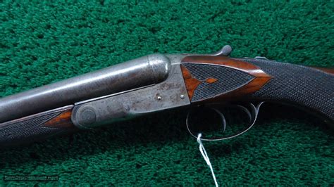 Sideplated Shotgun. Double-barrel side-by-side shotgun chambered for 10-, 12-, 16- or 20-gauge. Offered with 26", 28", 30" or 32" barrels, with various choke combinations. Barrels are Damascus or fluid steel. Damascus guns have become collectible and in better condition—very good to excellent—can bring nearly the same price as fluid-steel guns.. 