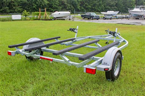 Double jetski trailer for sale. *NEW* Karavan All Aluminum Double Watercraft/Jet Ski Trailer, 84" Between Fenders, 101" Overall Width, 184" Overall Length, 360 lb Curb Weight, 2960 lb GVW, 2600 lb Carry Capacity, 13" Radial tires on Galvanized Rims, Dual Fully Adjustable winch posts, Full … 