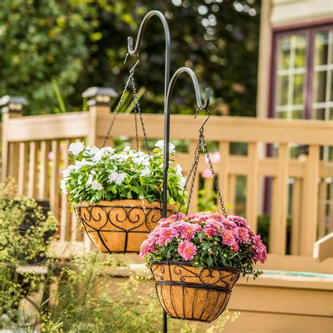 About this item . Upgraded Shepherds Hooks for Outdoor: The shepherds hook for bird feeder are designed with two strong and durable arms in a classic curved design, provides more hanging and display space and makes it more practical to hang various kinds of lanterns, flower baskets and more, to beautify your outdoor space.. 
