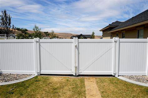 Double vinyl fence gate.  Open up your backyard with an American Vinyl Wor...