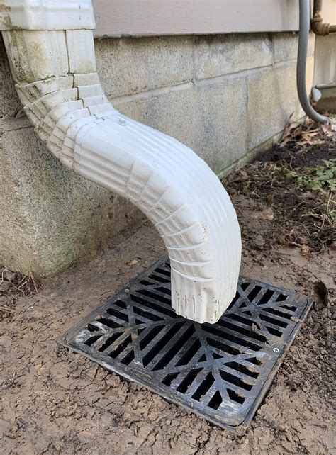 Downspout catch basin. Rock downspout catch basins are viable options as long as proper liners are placed underneath, boarders are constructed to constrain the flow of water, and proper slope is maintained. Water should be directed to at least 15′ away from a structure’s foundation. 