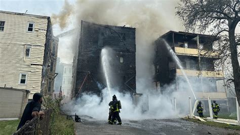 Dozens displaced after fire damages multiple buildings in Dorchester