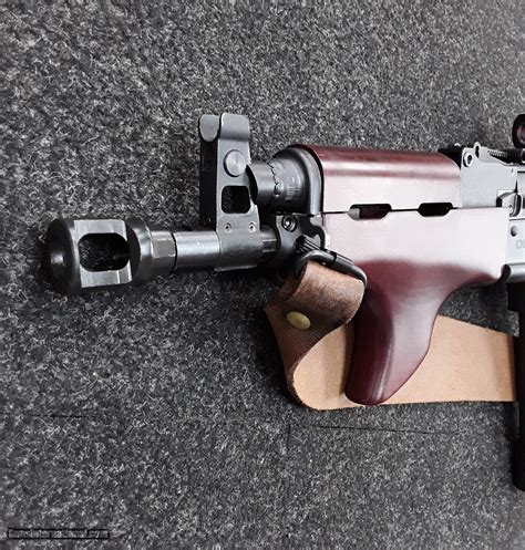 Draco nak9 muzzle brake.  Attaches directly to front sight block 24x1.  DRAC...