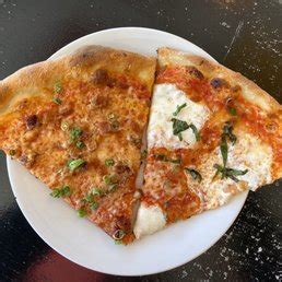 Dragon pizza yelp. Dragon Pizza has subsequently gone viral thanks to this interaction and flooded with negative reviews on Yelp which appear to have emerged since Portnoy shared his own review so it's hard to ... 