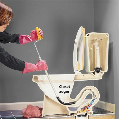 Drain snake for toilet. Step 1. Preparation. Prepare the area around the toilet for any likely mess. Lay a couple of towels around the base, position a large bucket nearby and put on rubber gloves. Step 2. Extend the auger to snake the toilet. Place the end of the auger into the … 