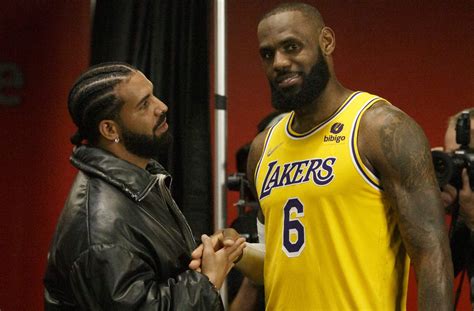 Drake walks out with Lebron and Bronny James at Los Angeles concert