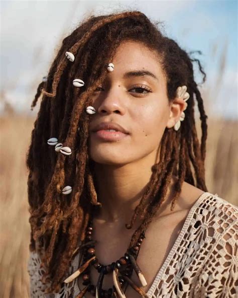 Dreadloc. Hair can be as short as 1 inch for some hair types. Hair types and textures will determine the appropriate hair length for the perfect start of short dreadlocks. Coarse Hair: As short as 1”. Loose Curls: Between 3” to 6”. Straight Hair: As short as 4”. Thin Hair: Recommended 8”. 