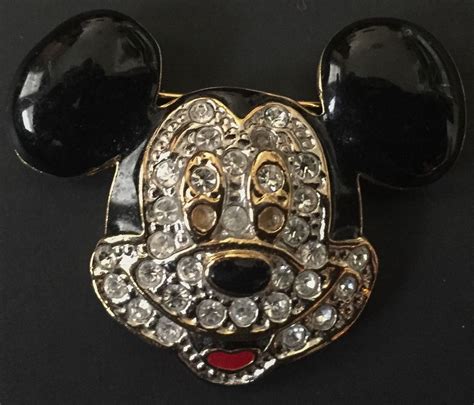 Expedition Pins- Dream Jeweled Mickey Mouse- This pin was an extremely limited release and includes real gemstones, making it very valuable. The original cost of this pin was released at $1295, …. 