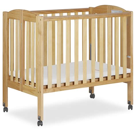 Dream on me 2 in 1 folding portable crib. The crib comes with the regulatory 1.5” mattress pad. Choose a Dream On Me non-toxic, Greenguard Gold certified mini or portable crib mattress for a perfect fit. All tools for assembly included. Dimensions (Overall): 36 Inches (H) x 28 Inches (W) x 38 Inches (D) Weight: 37 Pounds. Holds up to: 50 Pounds. 