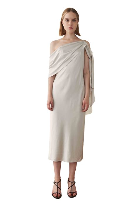 This crossword clue South Asian dress of draped silk